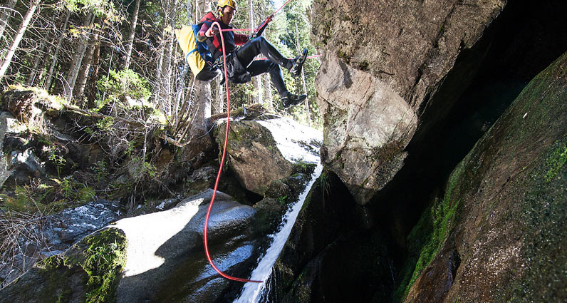 Rope down in a waterfall